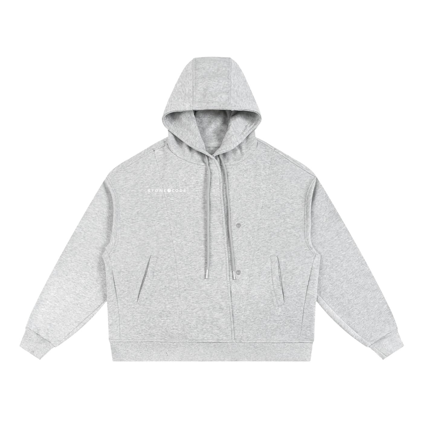 Light gray cotton blend oversized hoodie with button placket, drawstring hood, drop shoulders, and front pockets.