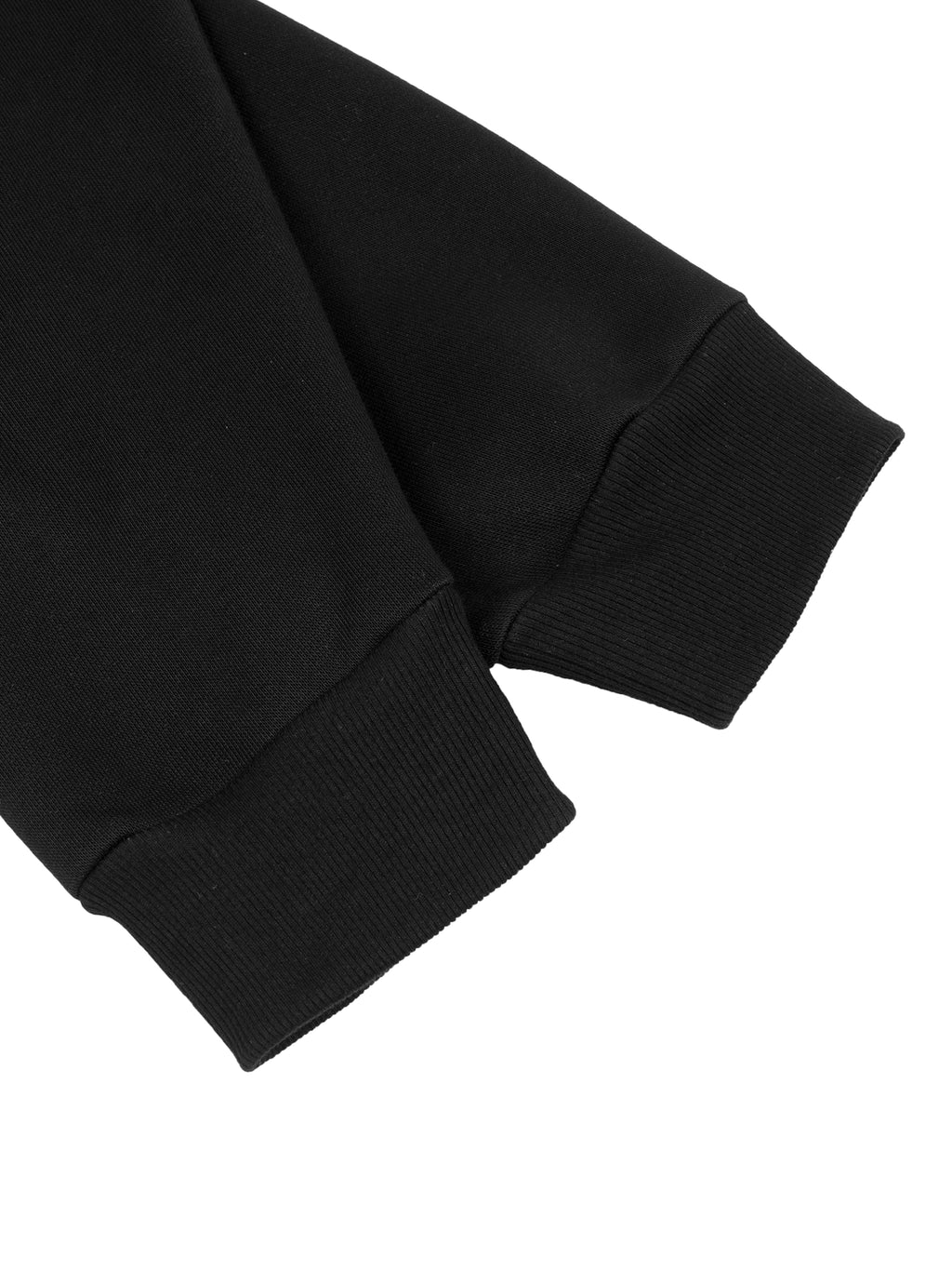 Close-up of a black cotton blend long sleeve with ribbed cuffs from the Contrast Plaid Boxy Zip Hoodie.