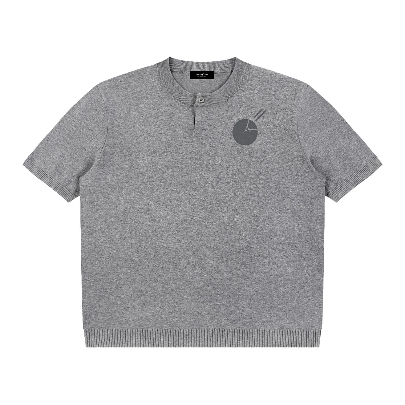 Oversized gray cotton knit short sleeve Henley t-shirt with a subtle dark gray graphic on the chest.