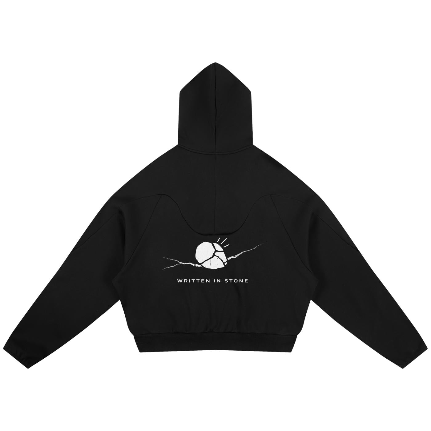 Black oversized raglan hoodie with a white "Written in Stone" graphic on the back.