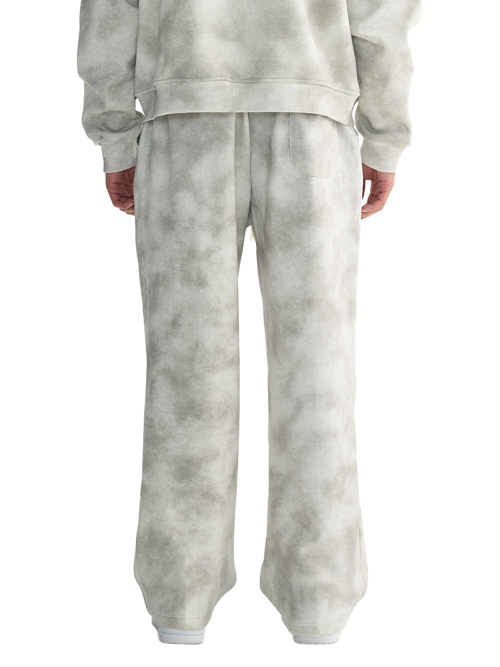 Unisex dirty washed grey fleece sweatpants with a loose fit and drawstring, shown from the back.