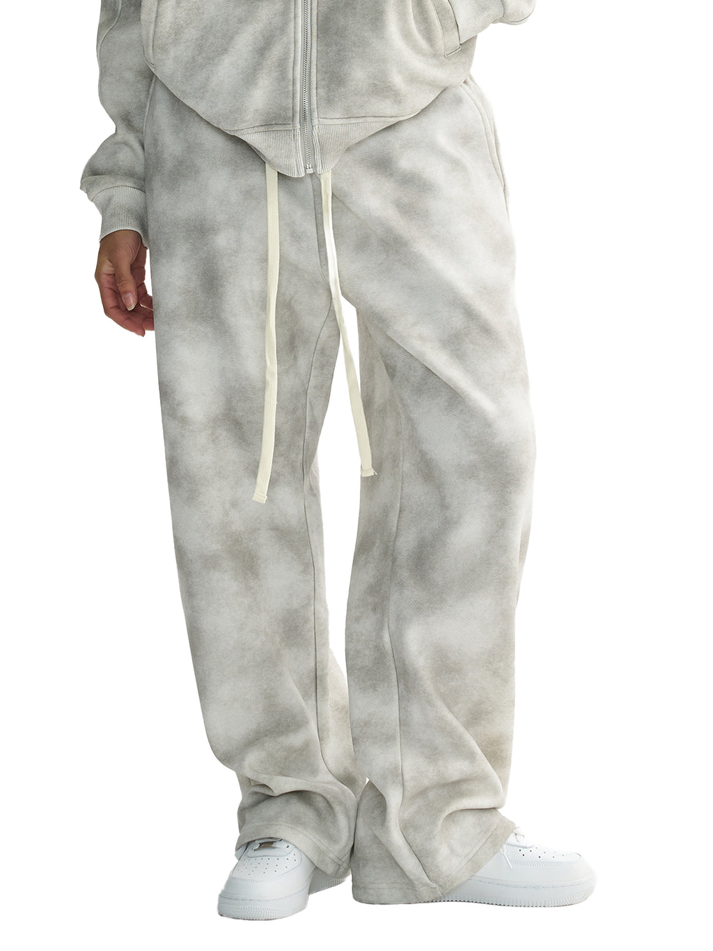 Unisex dirty washed fleece sweatpants in grey with a loose fit, drawstring, and mid-waist design.