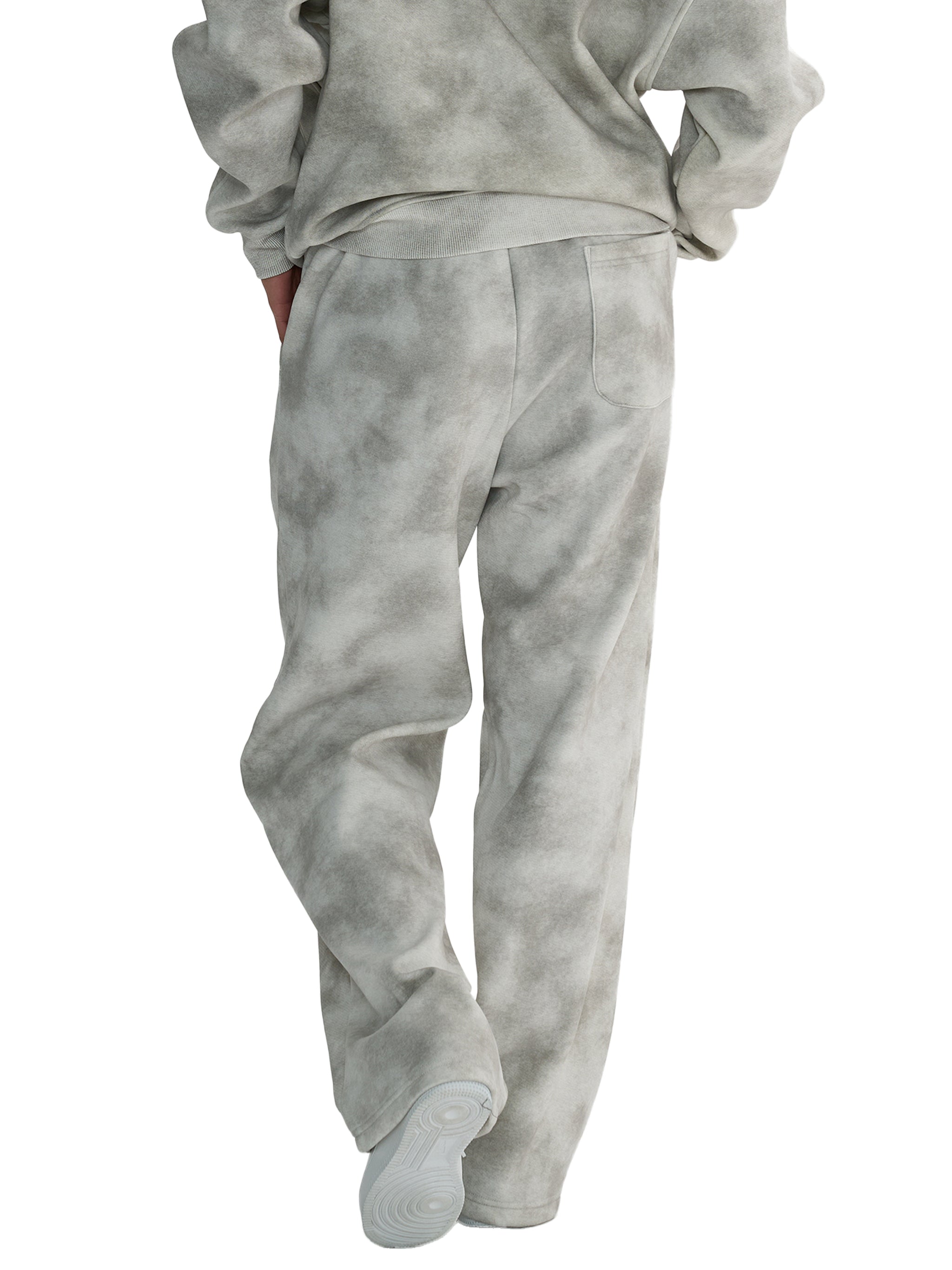 Unisex dirty washed grey fleece sweatpants with a loose fit, ribbed cuffs, and back pocket.