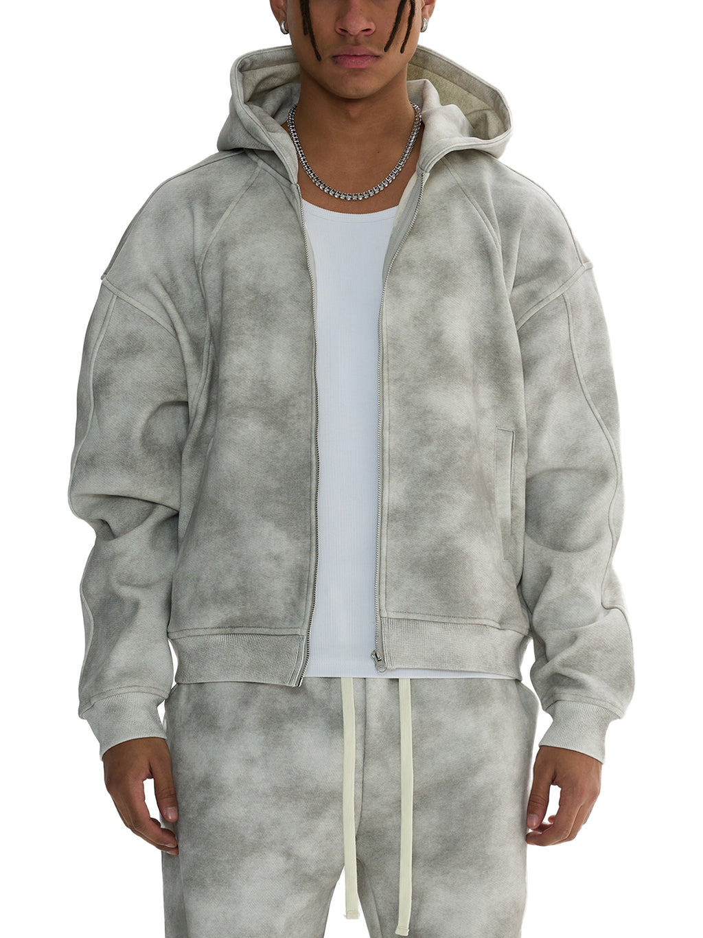 Unisex dirty washed grey zip-up fleece hoodie and matching sweatpants with pockets, worn by a model.