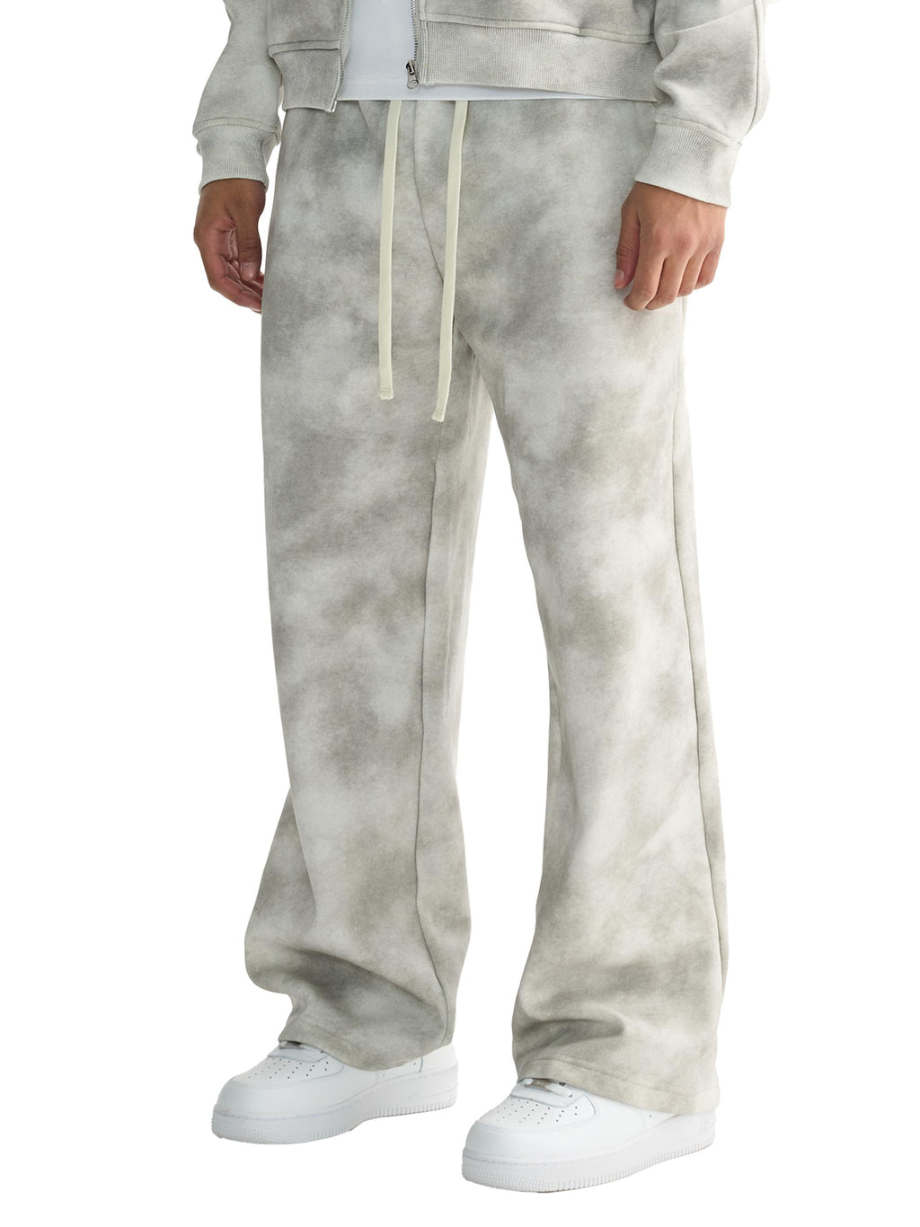 Unisex dirty washed grey fleece sweatpants with a loose fit, drawstring waist, and flared leg.
