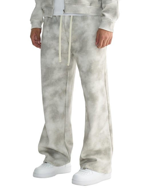 Unisex dirty washed grey fleece sweatpants with a loose fit, drawstring waist, and flared leg.