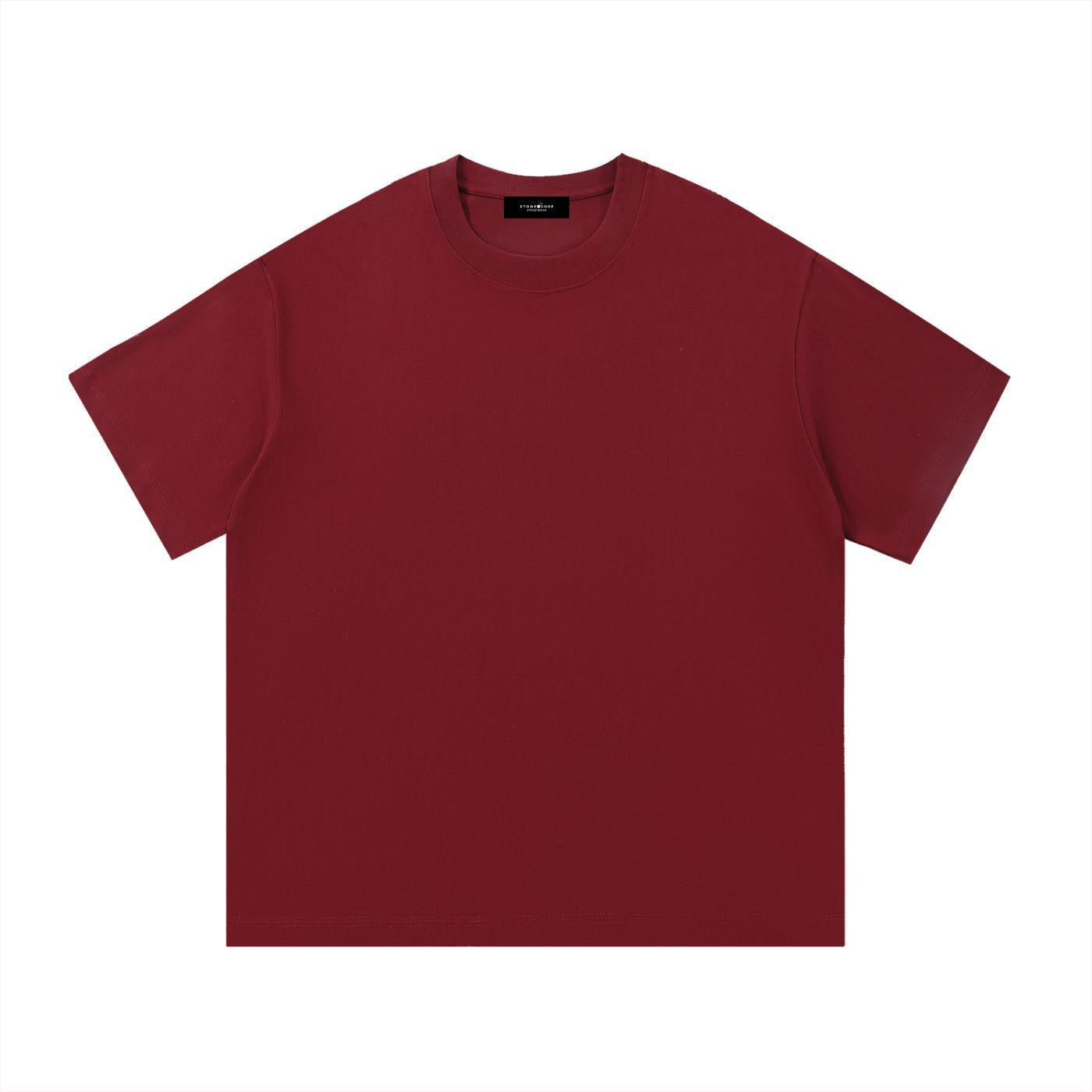 Essential Cotton T-Shirt in a rich red hue, featuring a round neck, short sleeves, and a loose fit.