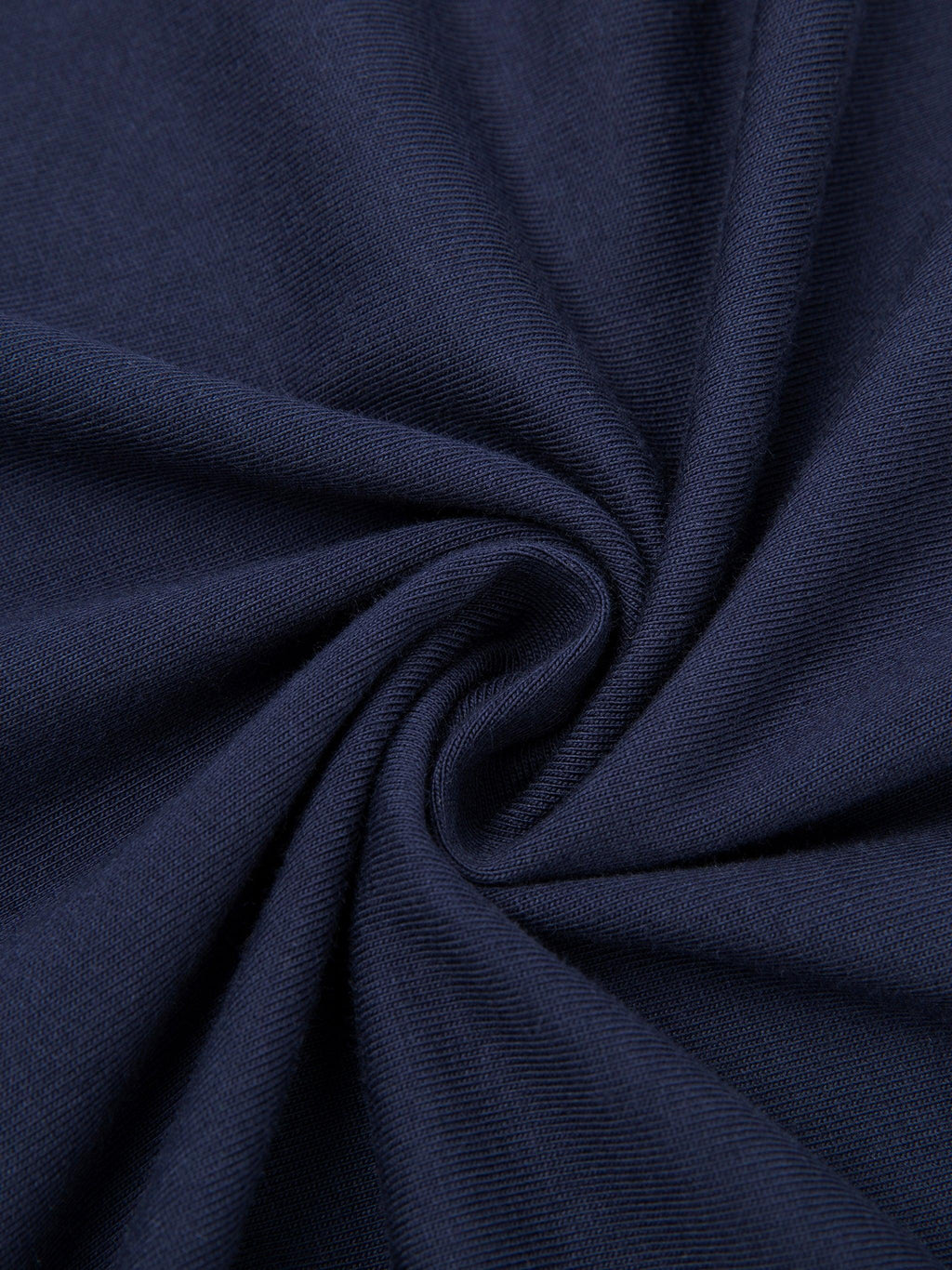 Close-up of a dark blue, 100% cotton Essential T-Shirt fabric, showing its moderate thickness and soft texture.
