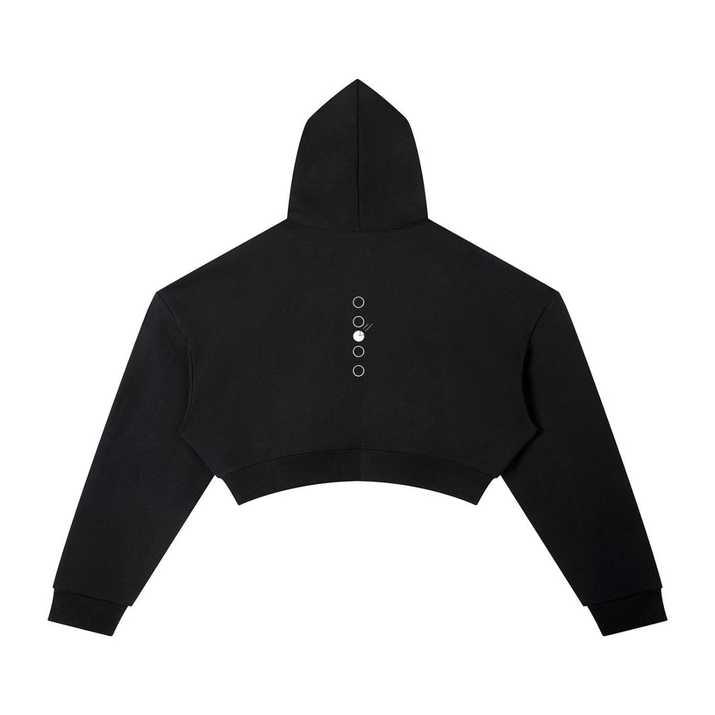 Black oversized cropped hoodie with drop shoulders, long sleeves, and a white circular graphic design on the back.