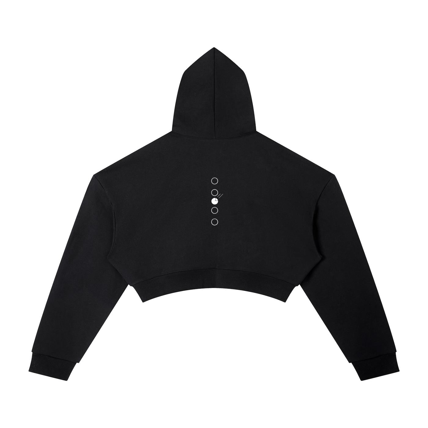 Black oversized cropped hoodie with drop shoulders, long sleeves, and a white circular graphic design on the back.