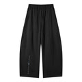 Black heavyweight wide leg panel sweatpants with drawstring waist, side pockets, and "STONE CODE" logo.