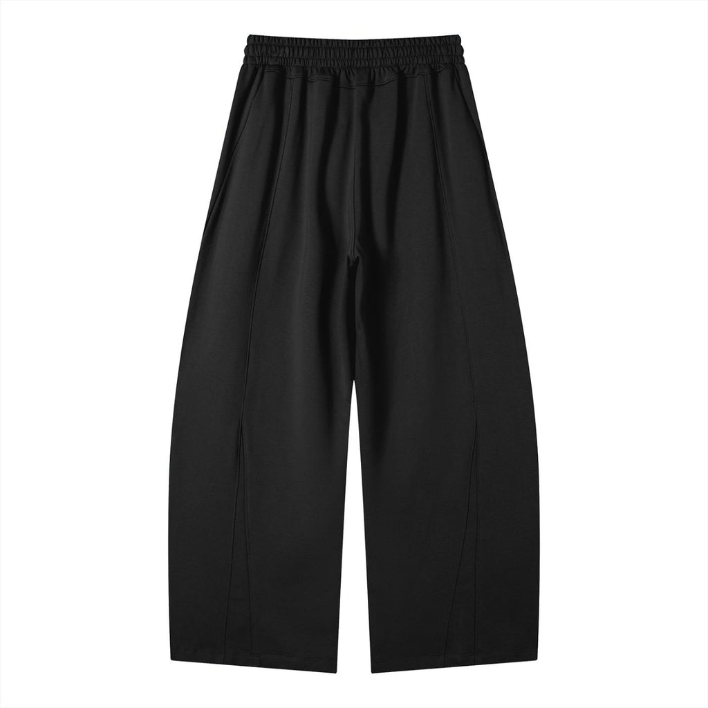 Black heavyweight wide leg panel sweatpants with elastic waist and cotton blend fabric.