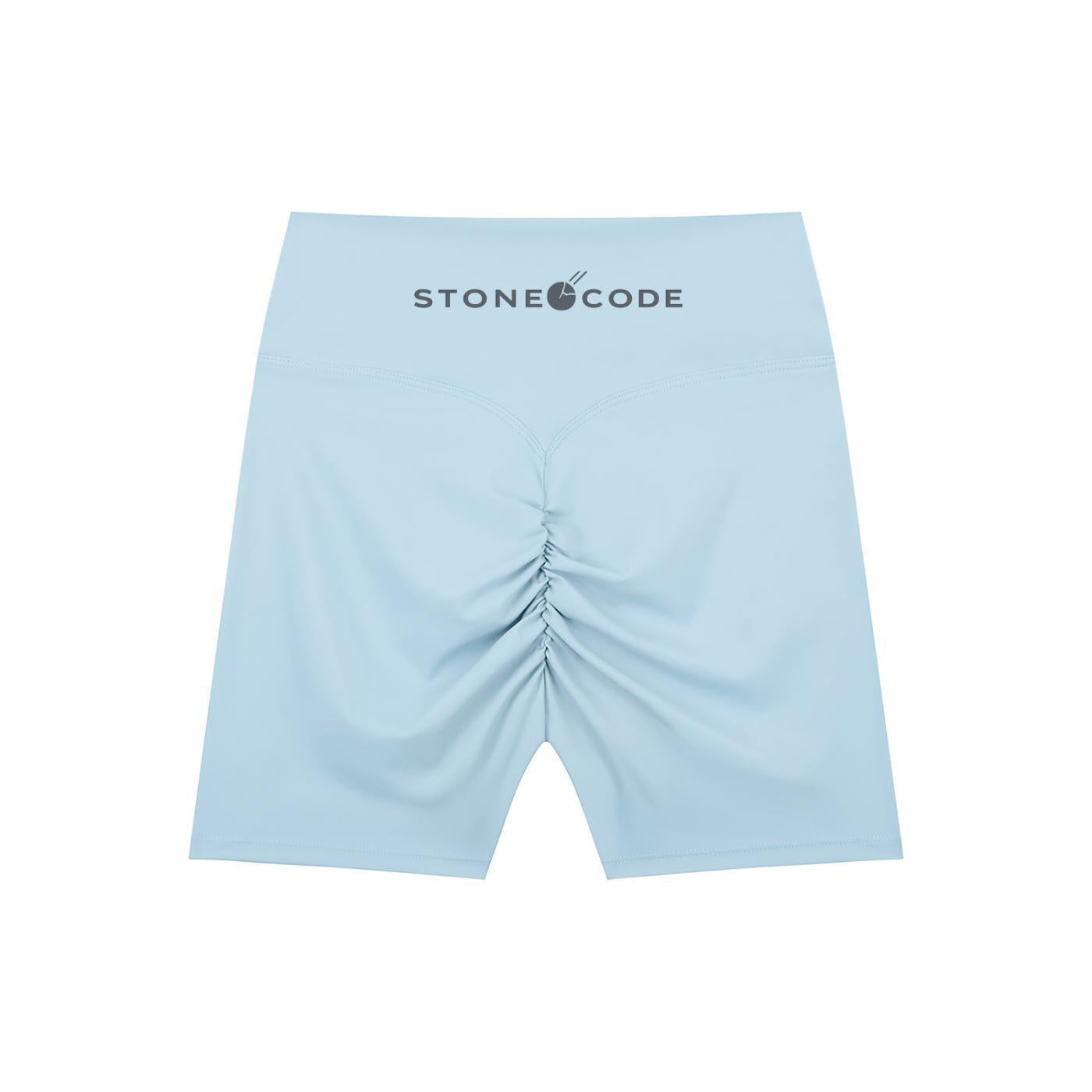 Light blue high-waisted biker shorts with Stone Code logo and ruched back detail.