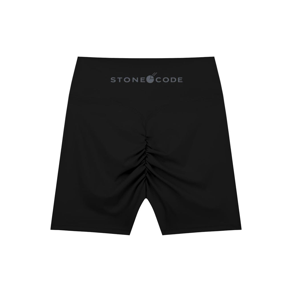 Black high-waisted biker shorts with "STONE CODE" logo on waistband and ruched back detail.