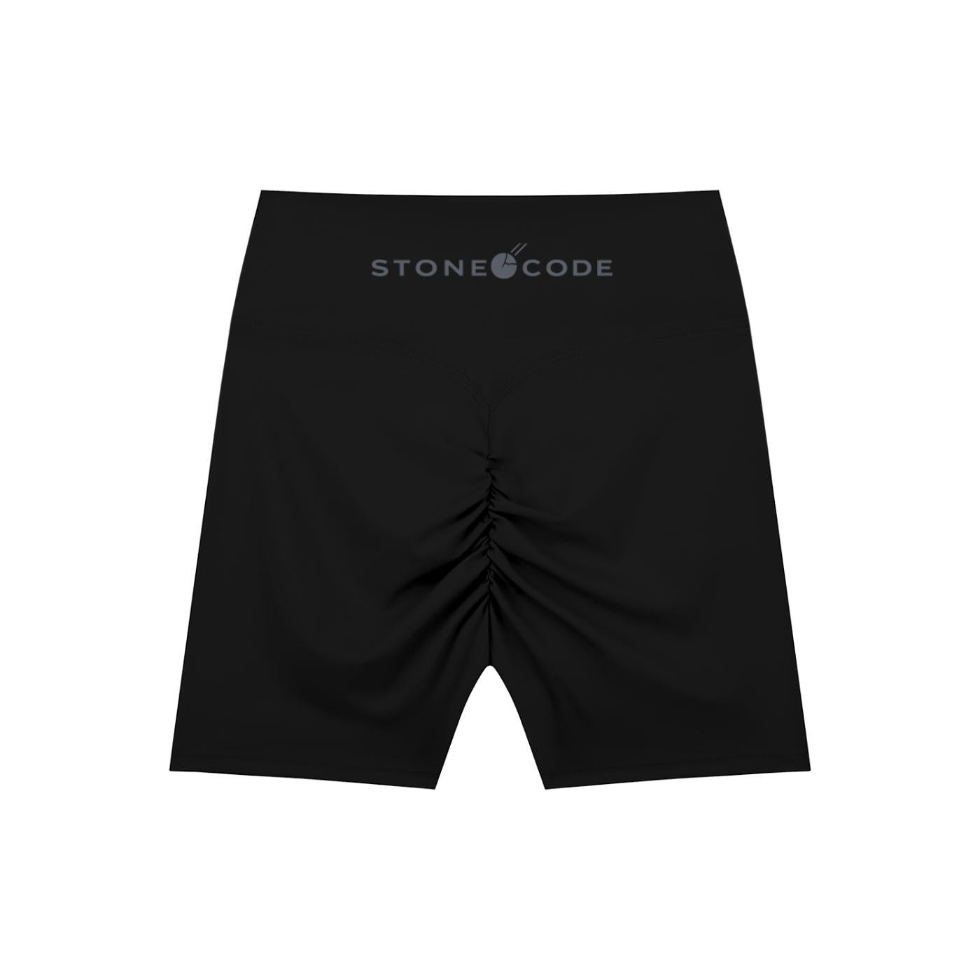 Black high-waisted biker shorts with "STONE CODE" logo on waistband and ruched back detail.