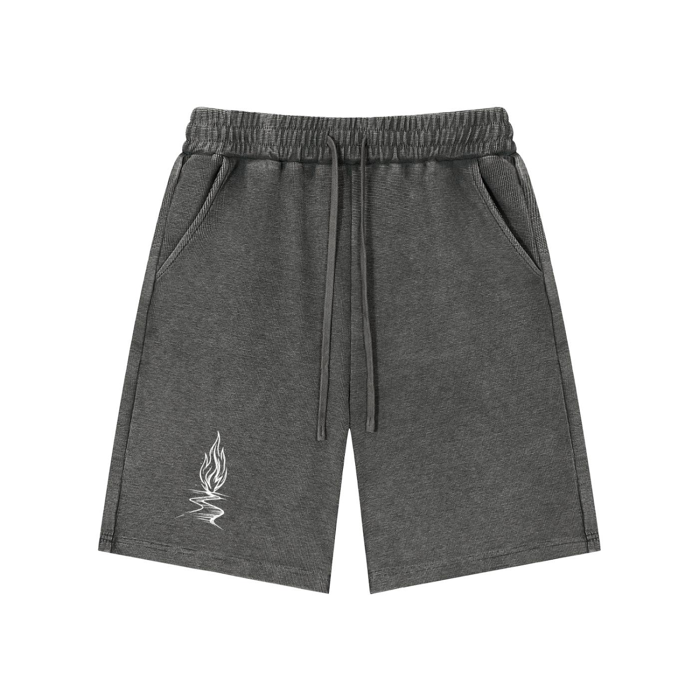 Mineral wash waffle knit shorts in dark gray with a white flame graphic, drawstring waist, and pockets.