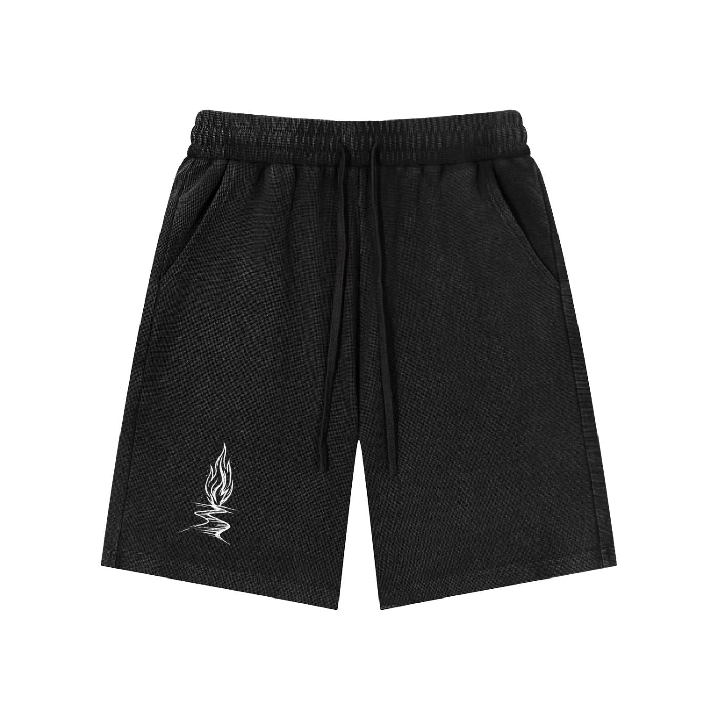Black mineral wash waffle knit shorts with a white flame graphic and drawstring.