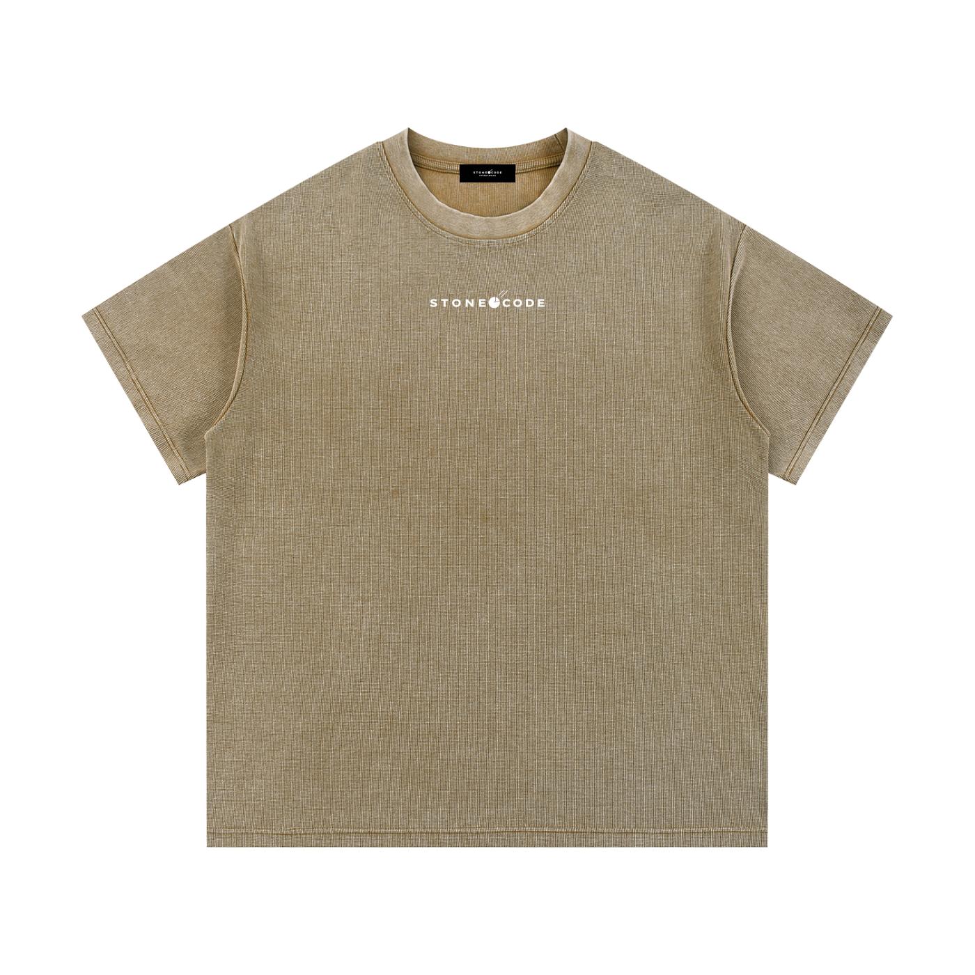 Mineral wash waffle knit t-shirt in a loose fit, featuring a round neck, drop shoulders, and "STONECODE" print.