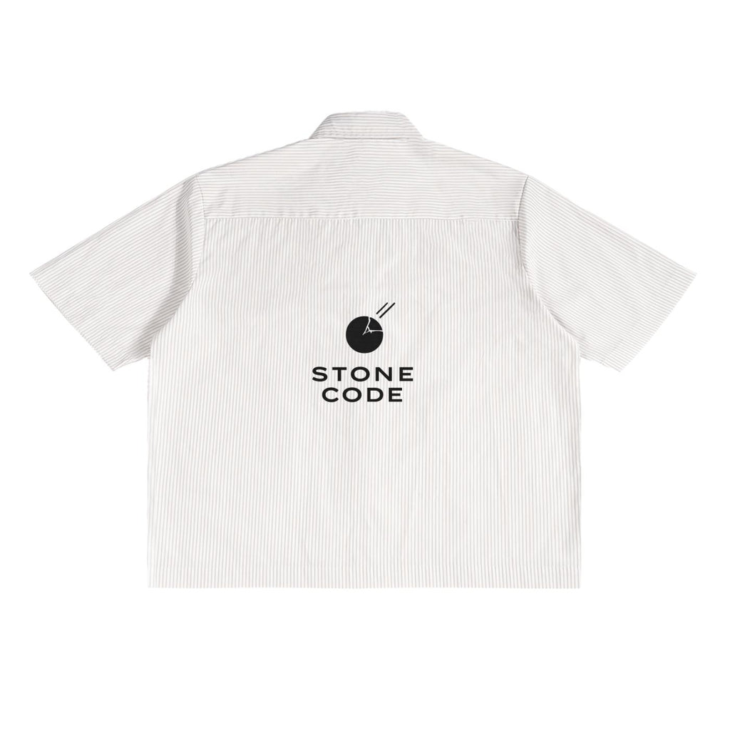 Back of an oversized white polyester boxy shirt with subtle vertical stripes and a black "STONE CODE" logo.