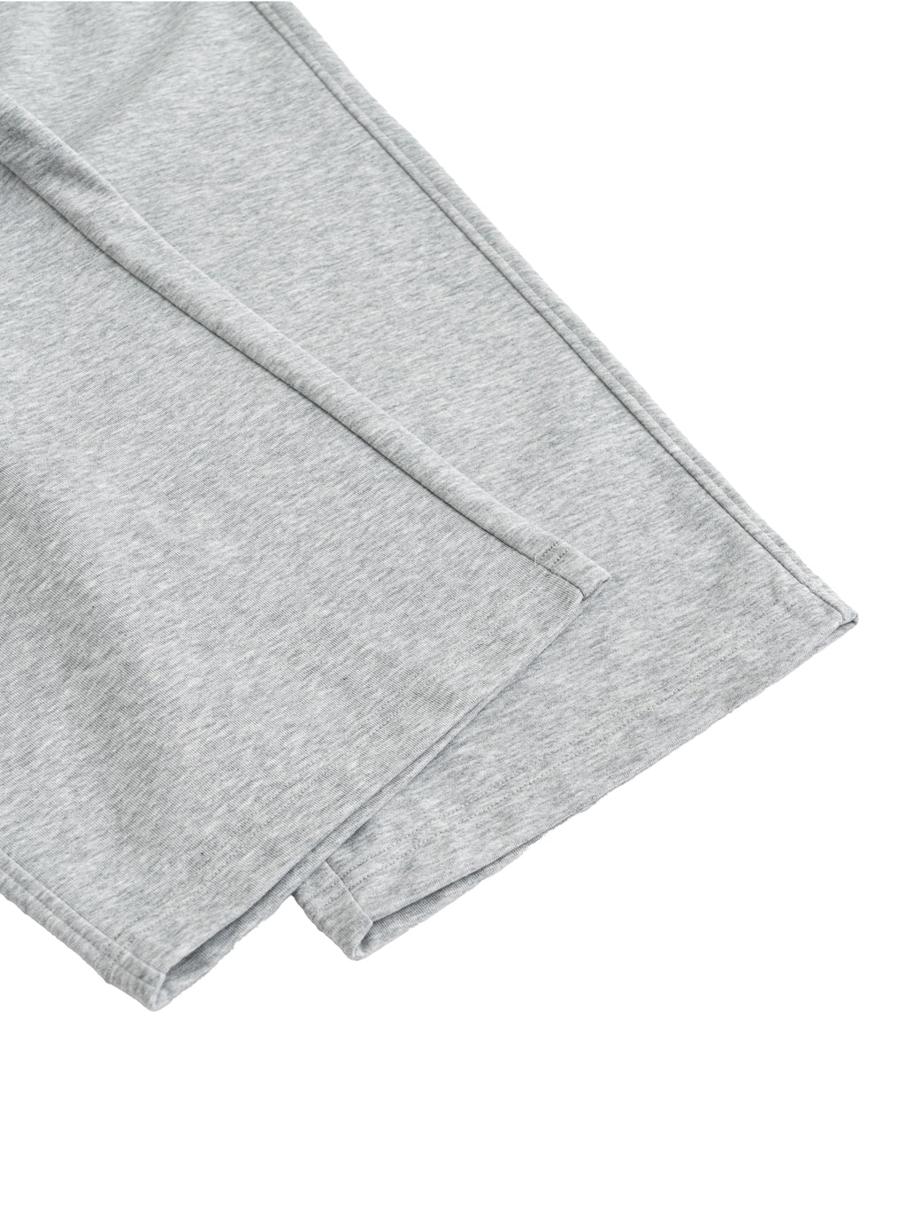 Light gray cotton-polyester blend sweatpants, showing the fabric texture and stitched seams.