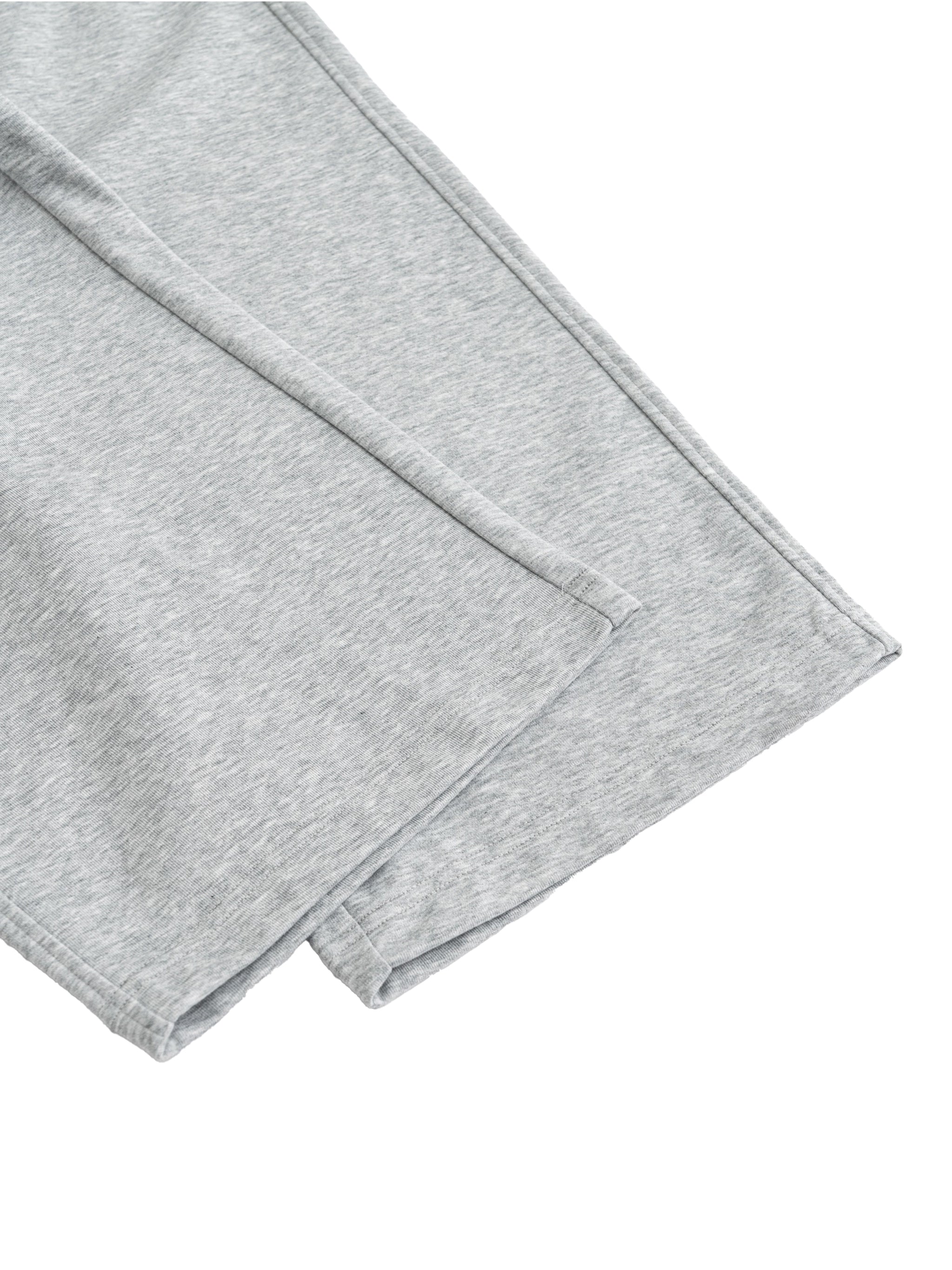 Light gray cotton-polyester blend sweatpants, showing the fabric texture and stitched seams.