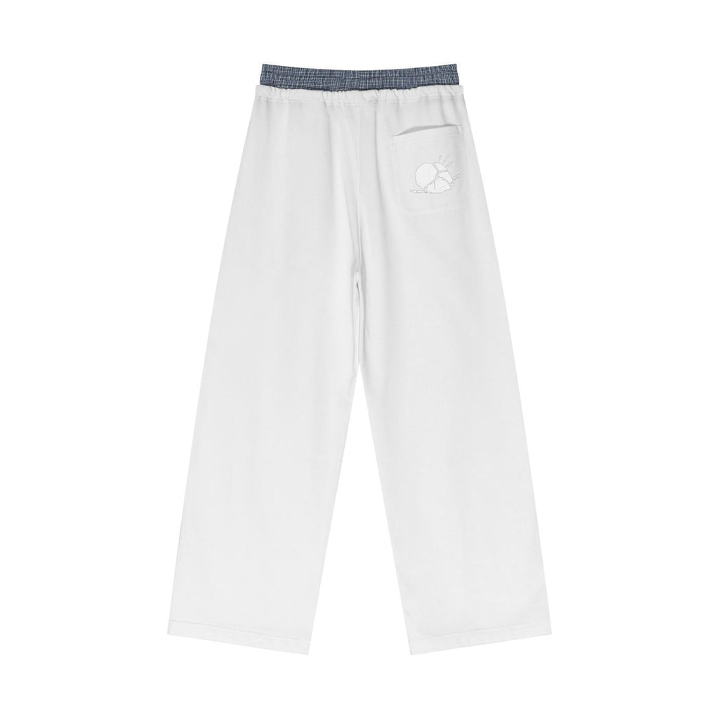 White unisex plaid contrast waist pants with a subtle sun graphic on the back pocket.
