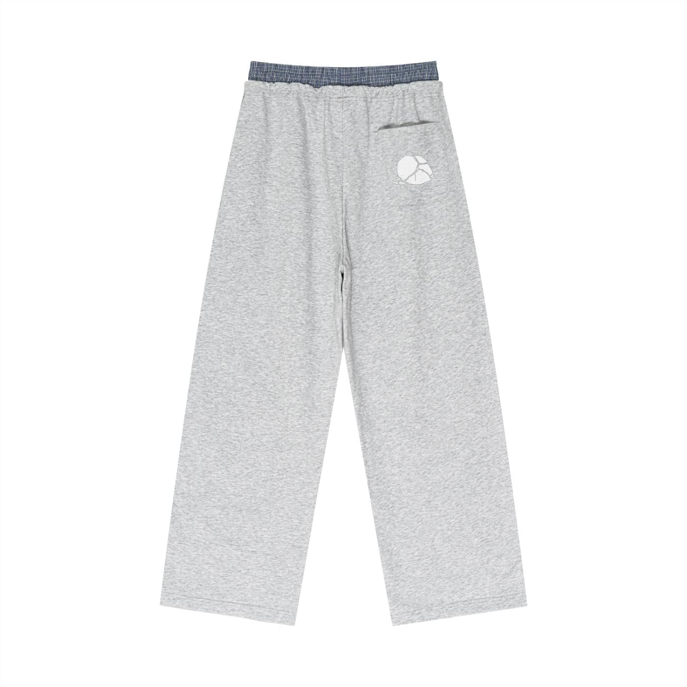 Unisex grey cotton-polyester blend plaid contrast waist pants with a white logo on the back pocket.