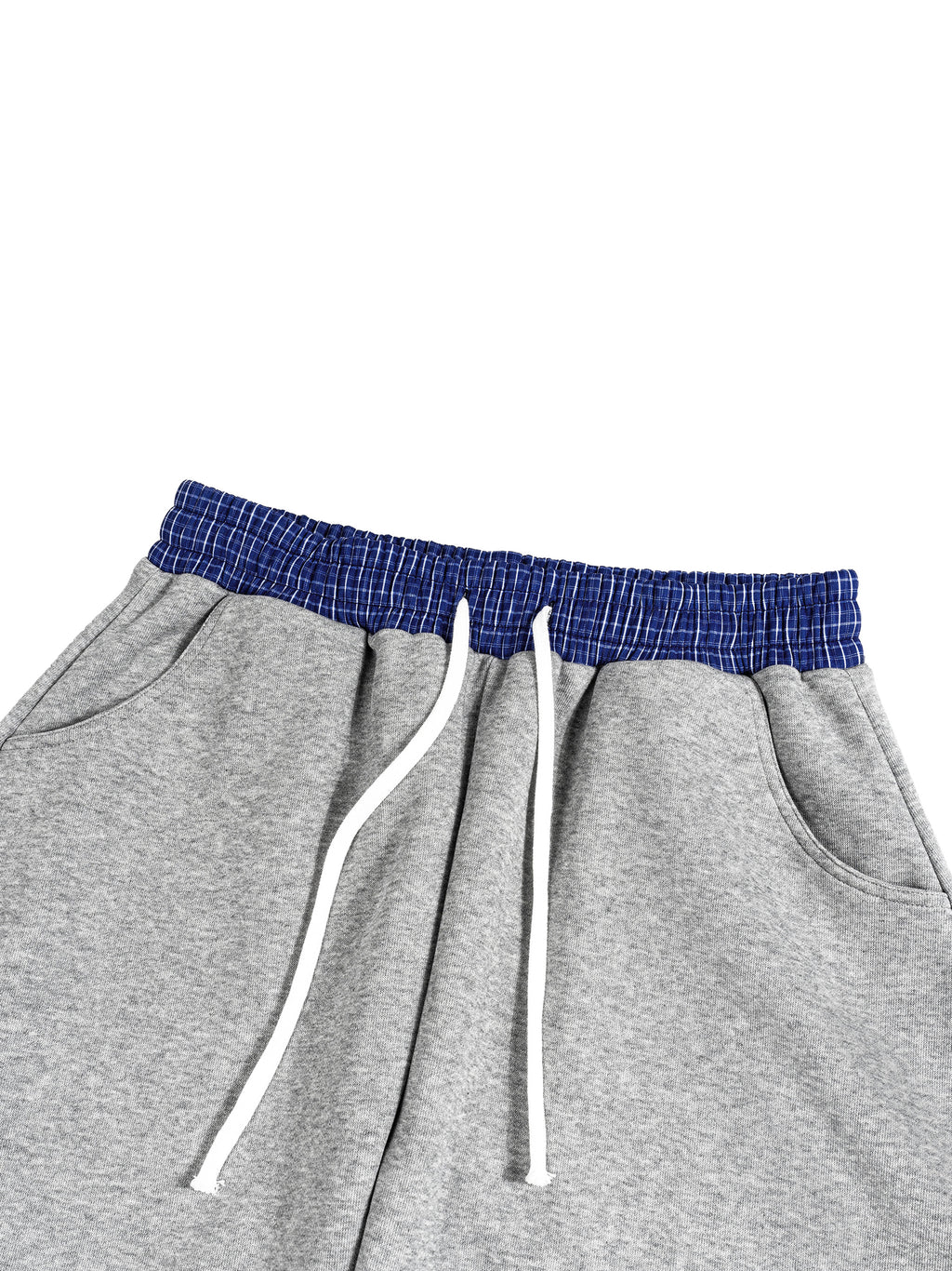Gray cotton blend barrel sweatpants with a blue plaid elastic waistband and white drawstring.