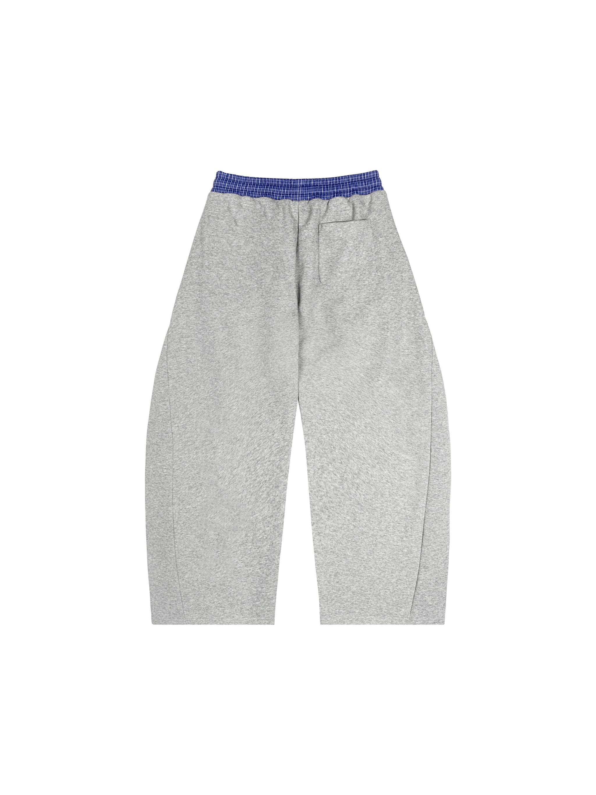 Gray cotton blend barrel sweatpants with a blue plaid waistband and back pocket.