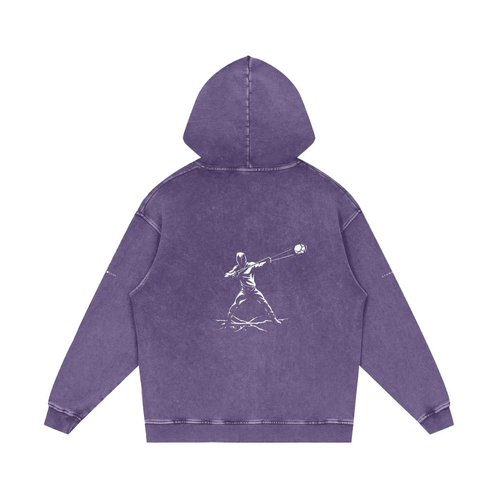 Unisex snow washed loose cotton hoodie in purple with a white graphic print on the back.