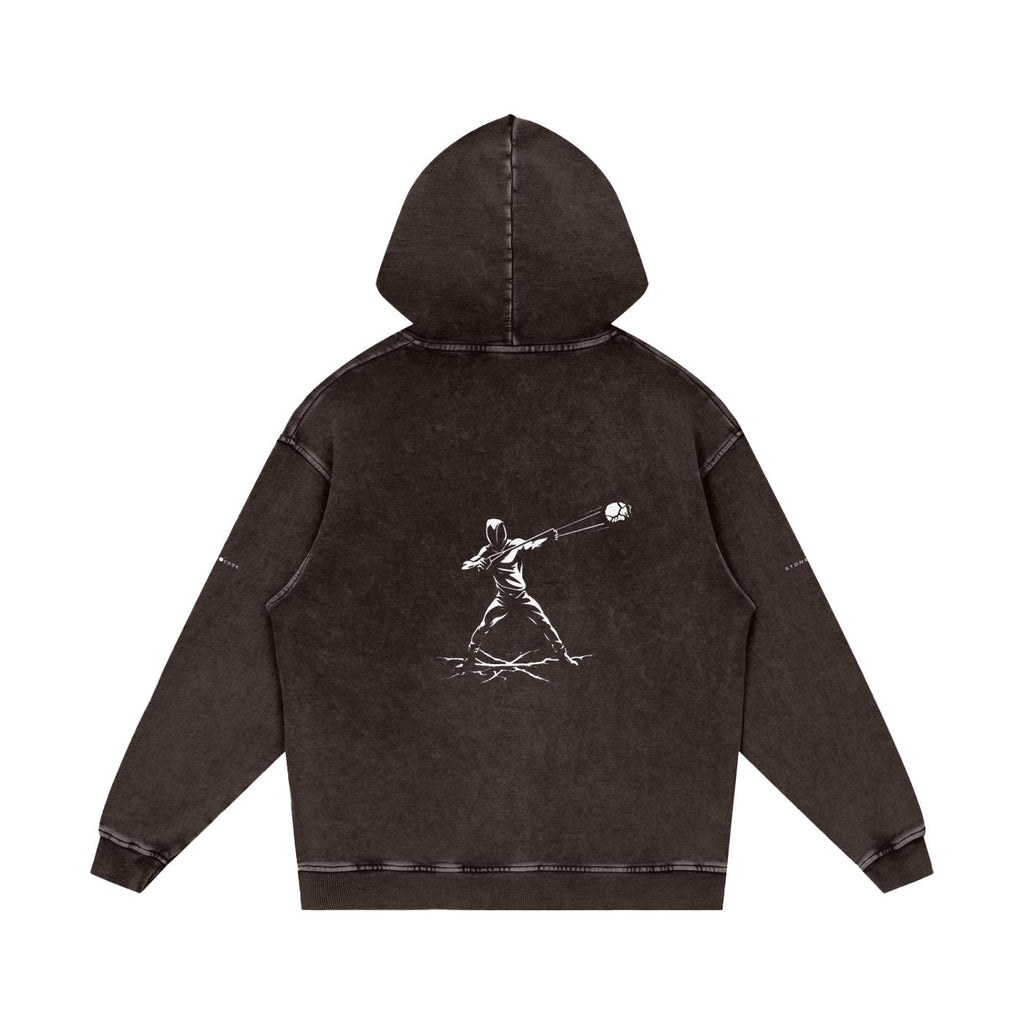Snow washed loose cotton hoodie in dark brown with a white graphic print of a figure throwing a ball on the back.