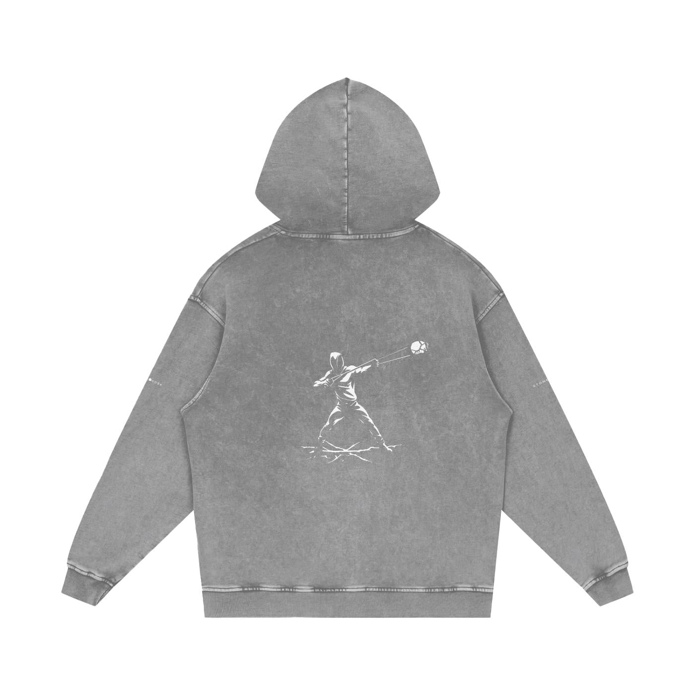 Back of a snow-washed loose grey cotton hoodie with a white graphic print of a figure throwing a ball.