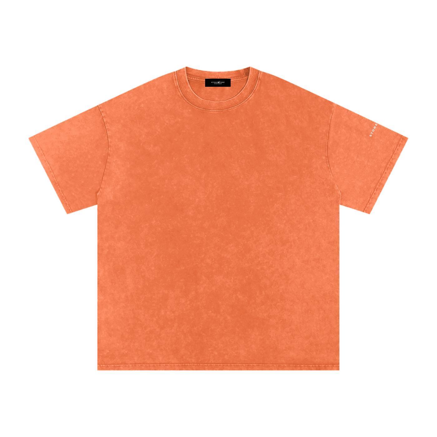 Orange snow washed oversized cotton t-shirt with drop shoulders and a subtle logo on the sleeve.