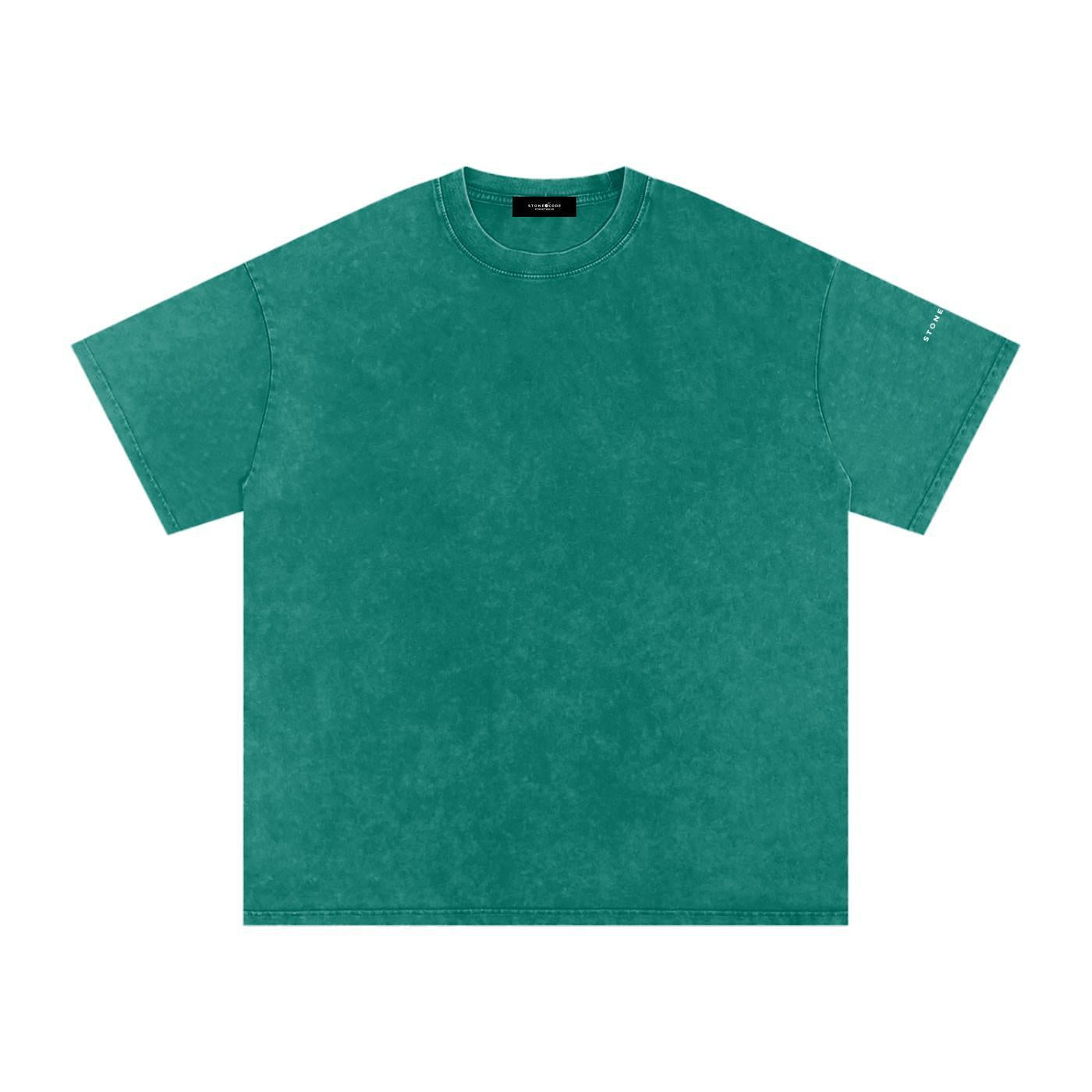 Snow washed oversized cotton t-shirt in a vibrant teal green with a round neck and drop shoulders.