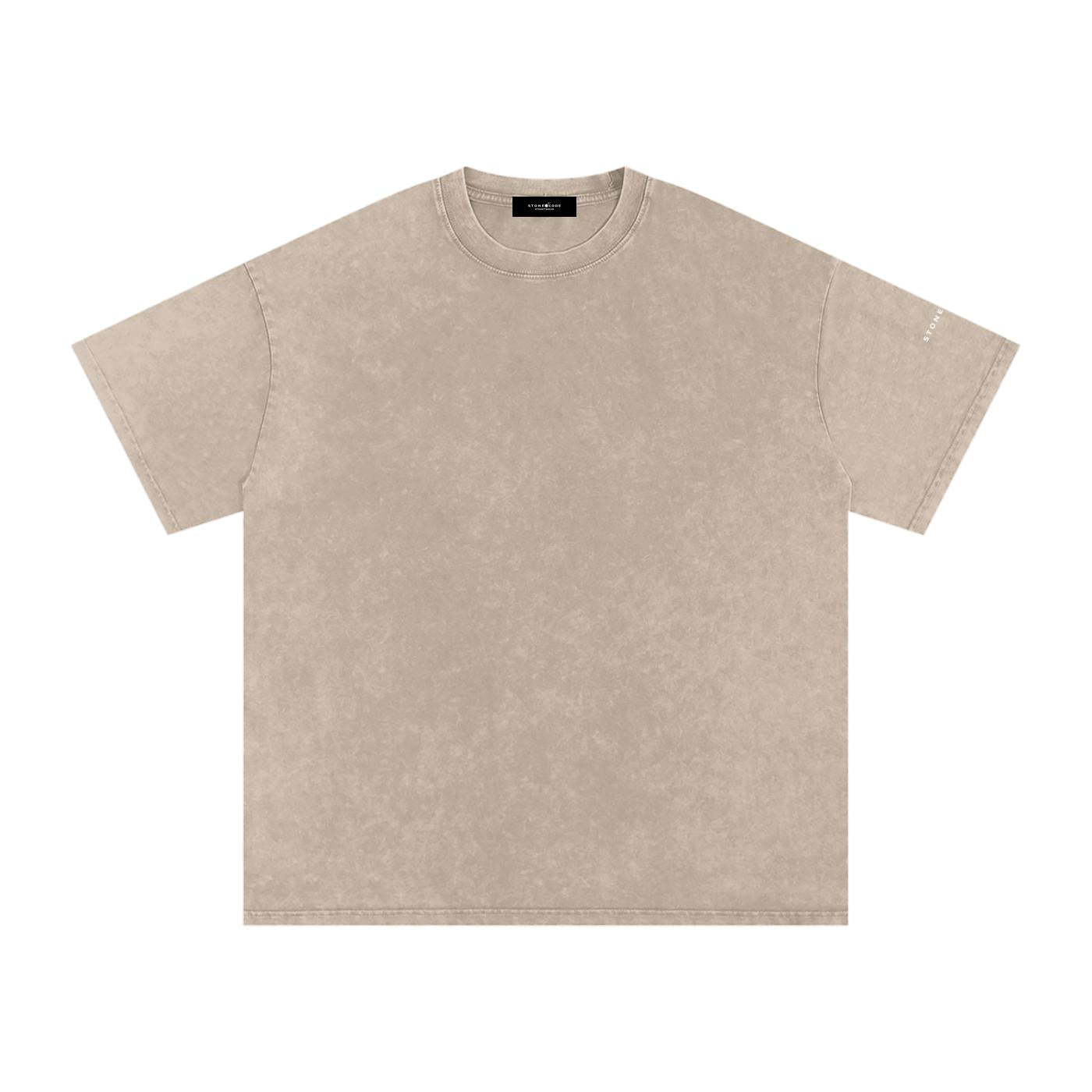 Snow washed oversized cotton t-shirt in a neutral beige, featuring a round neck and drop shoulders.
