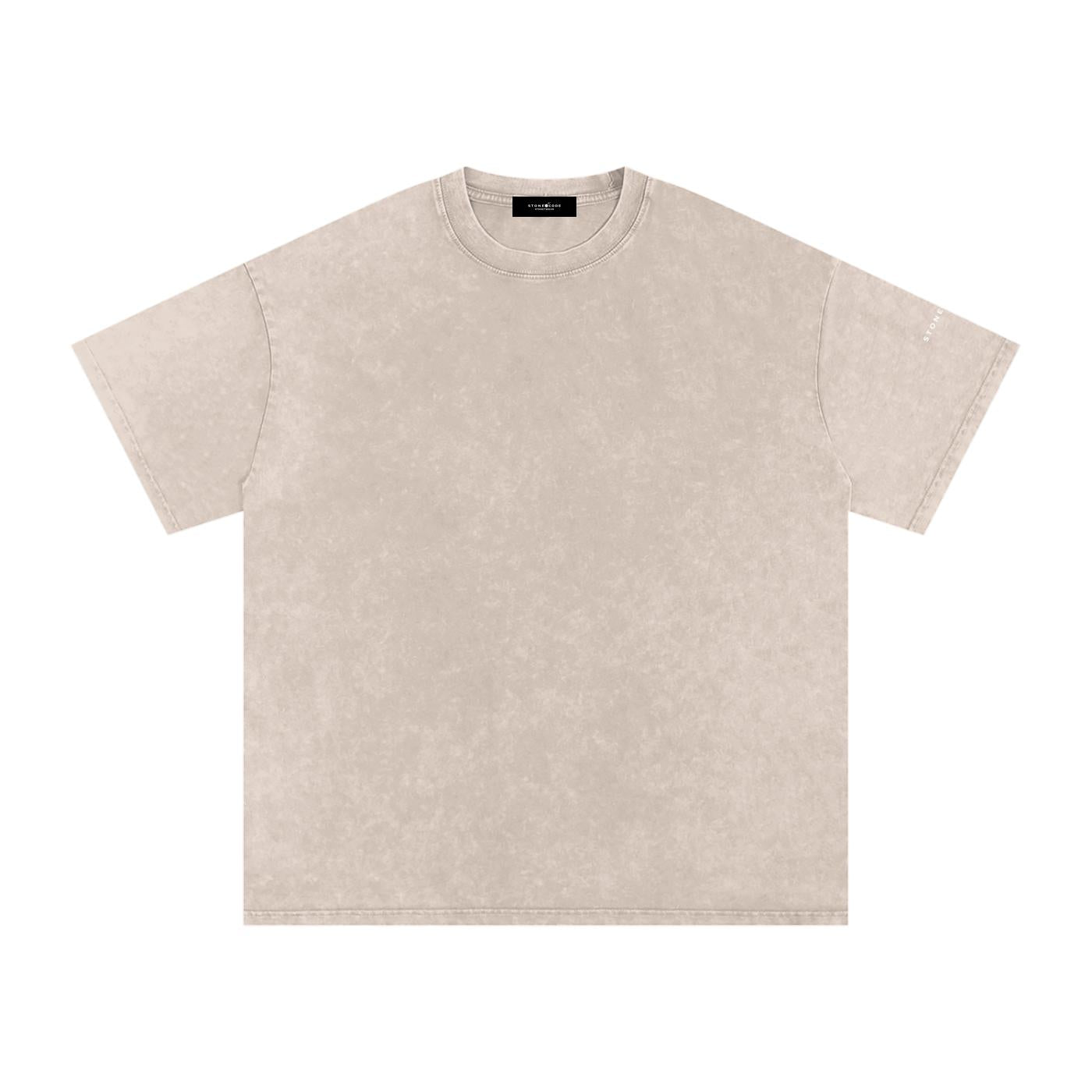 Unisex snow washed oversized cotton t-shirt in a light beige, featuring a round neck and drop shoulders.