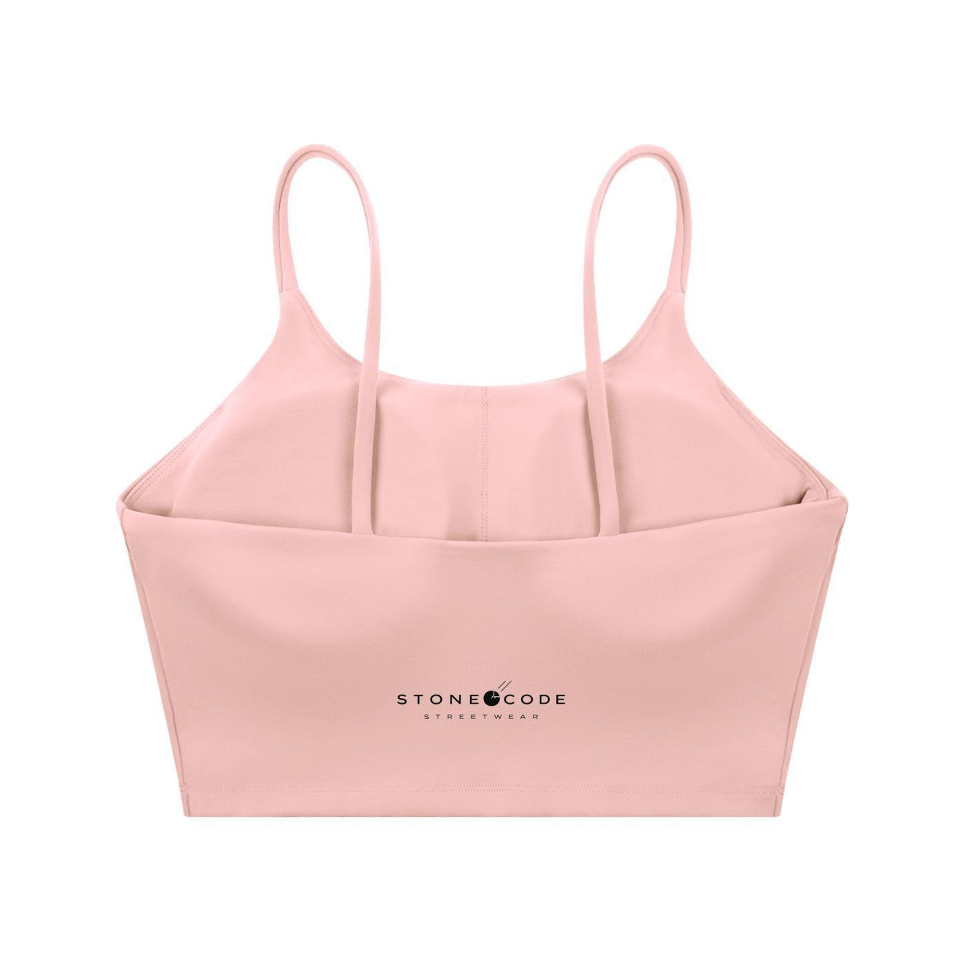 Pink spaghetti strap yoga sports bra with "STONE CODE STREETWEAR" logo on the back.