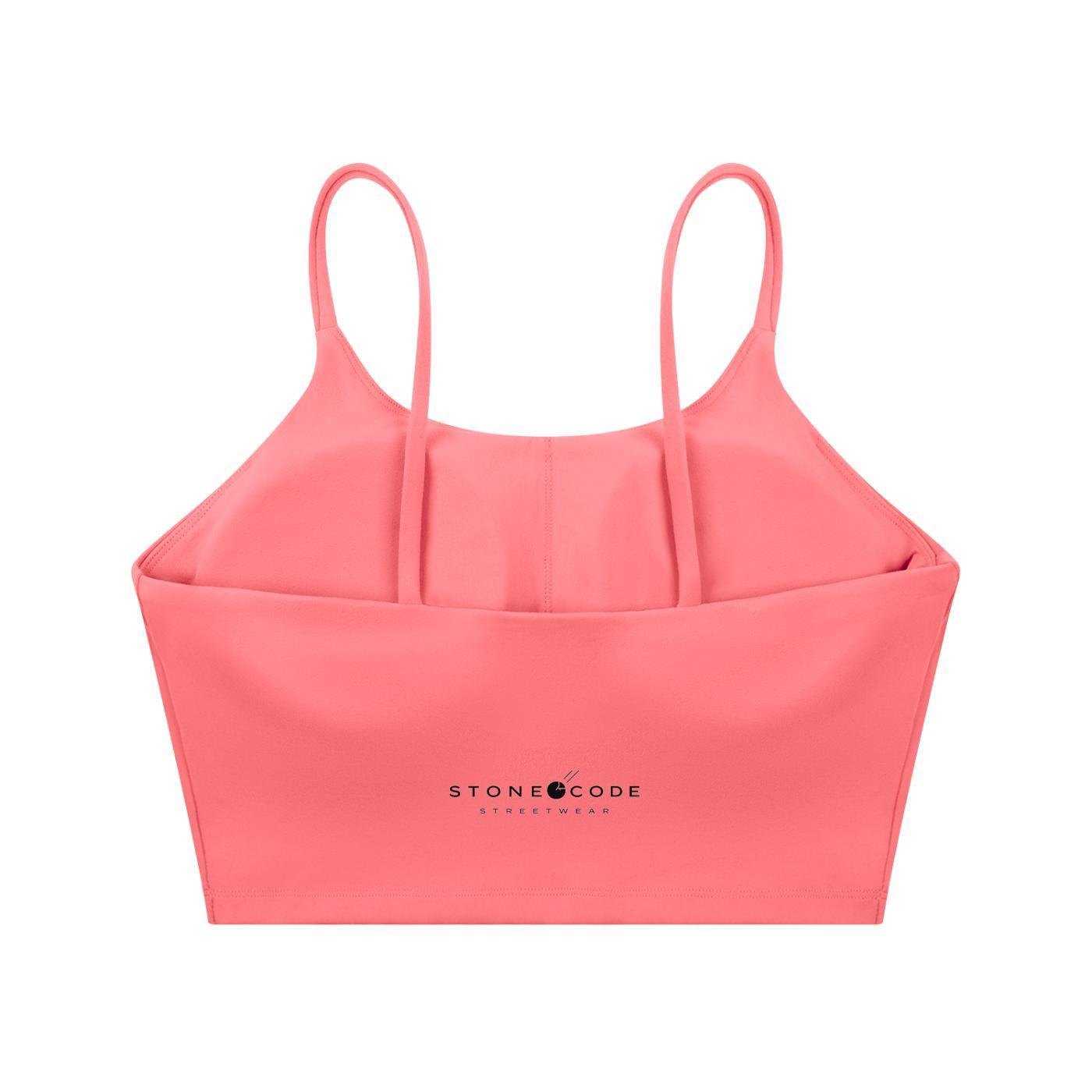 Coral spaghetti strap yoga sports bra with "STONE CODE STREETWEAR" logo on the back.