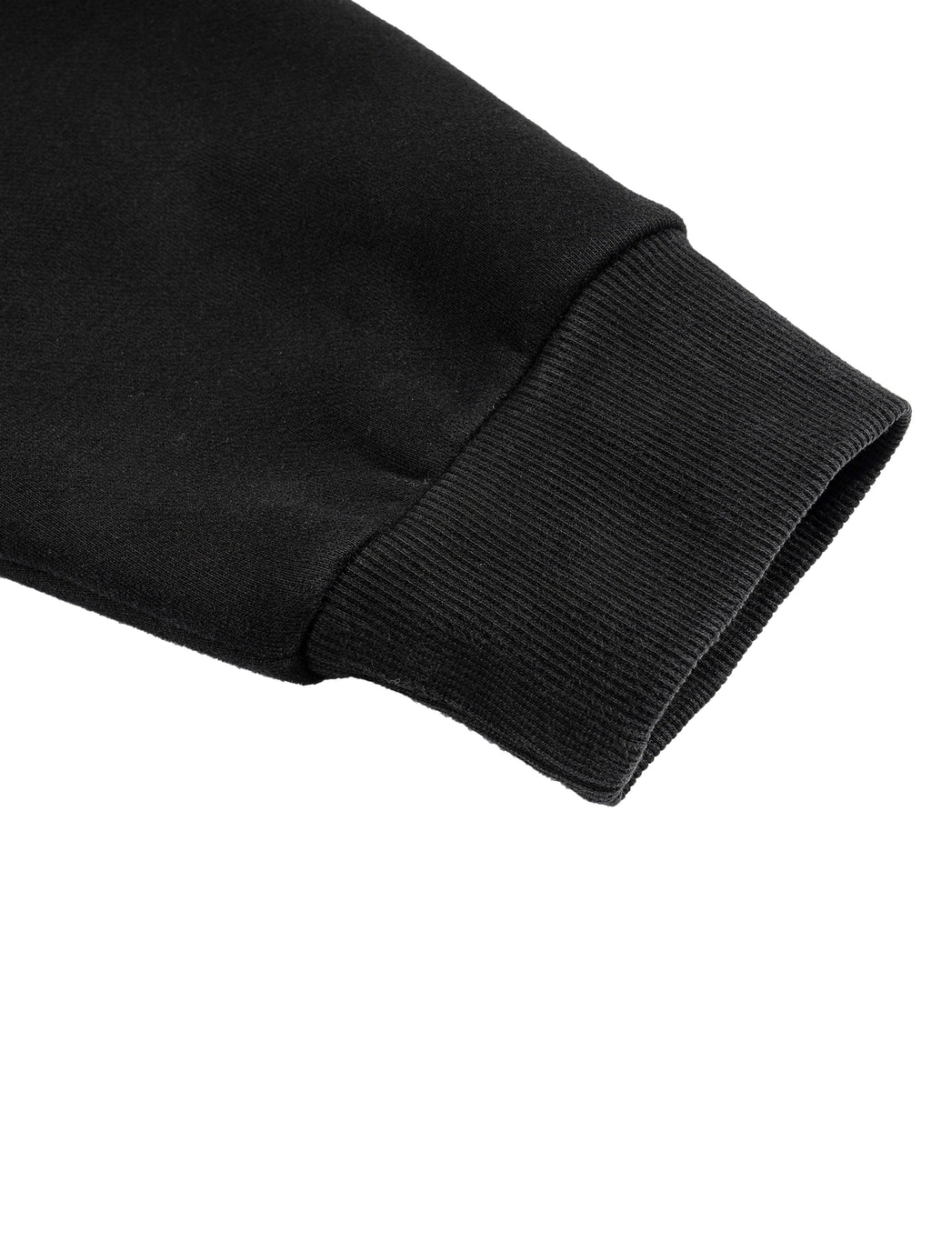 Close-up of a black long sleeve with ribbed cuff, showcasing the cotton blend fabric.