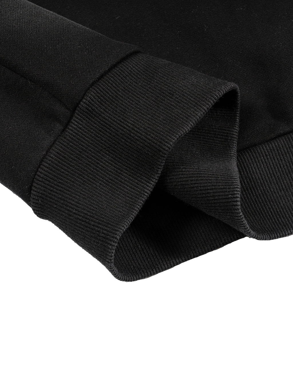 Close-up of a black cotton blend Sun Fade Boxy Detachable Fur Hoodie sleeve with ribbed cuff.