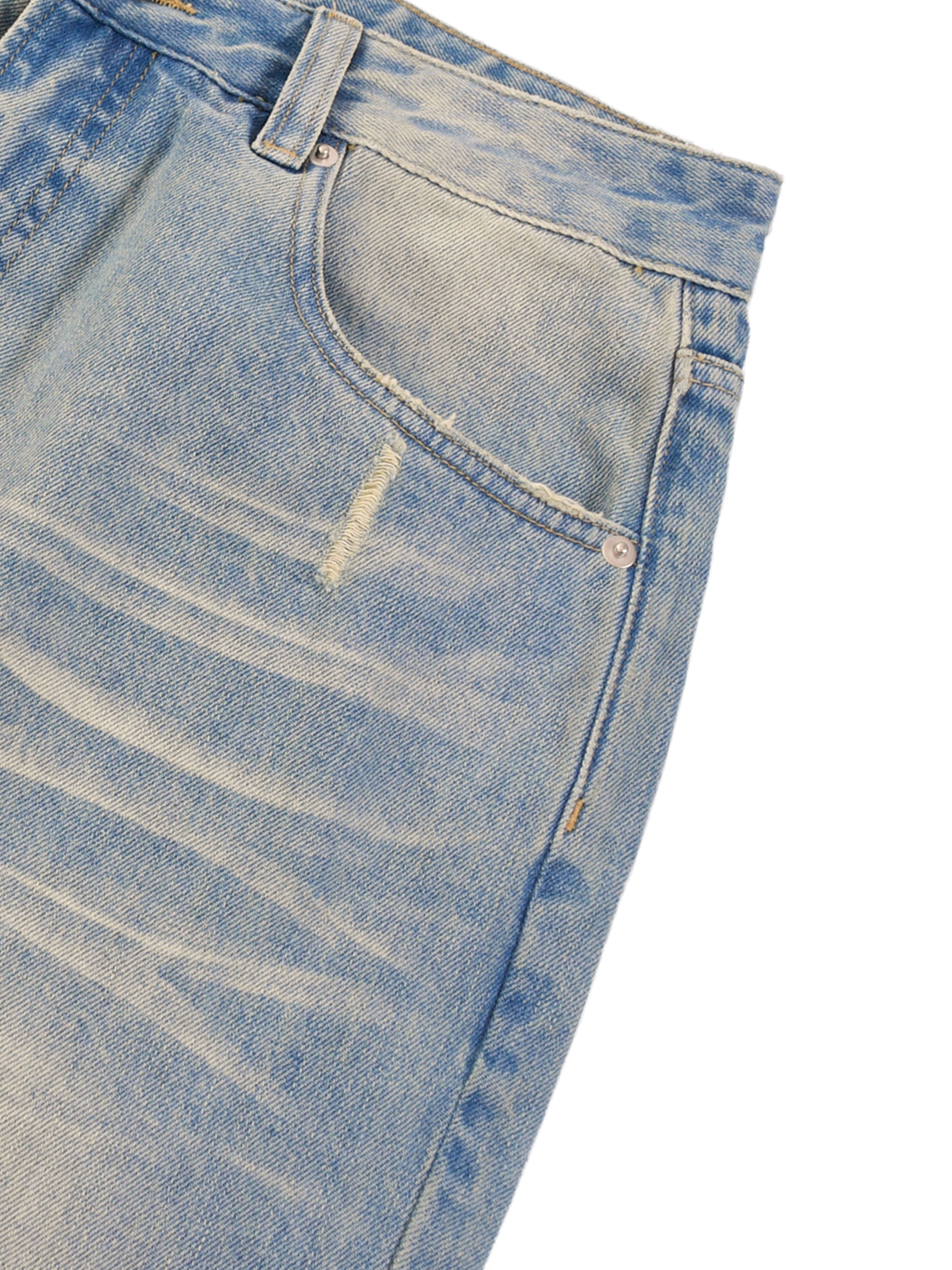 Sun fade raw hem denim jeans with distressed details and a front pocket.