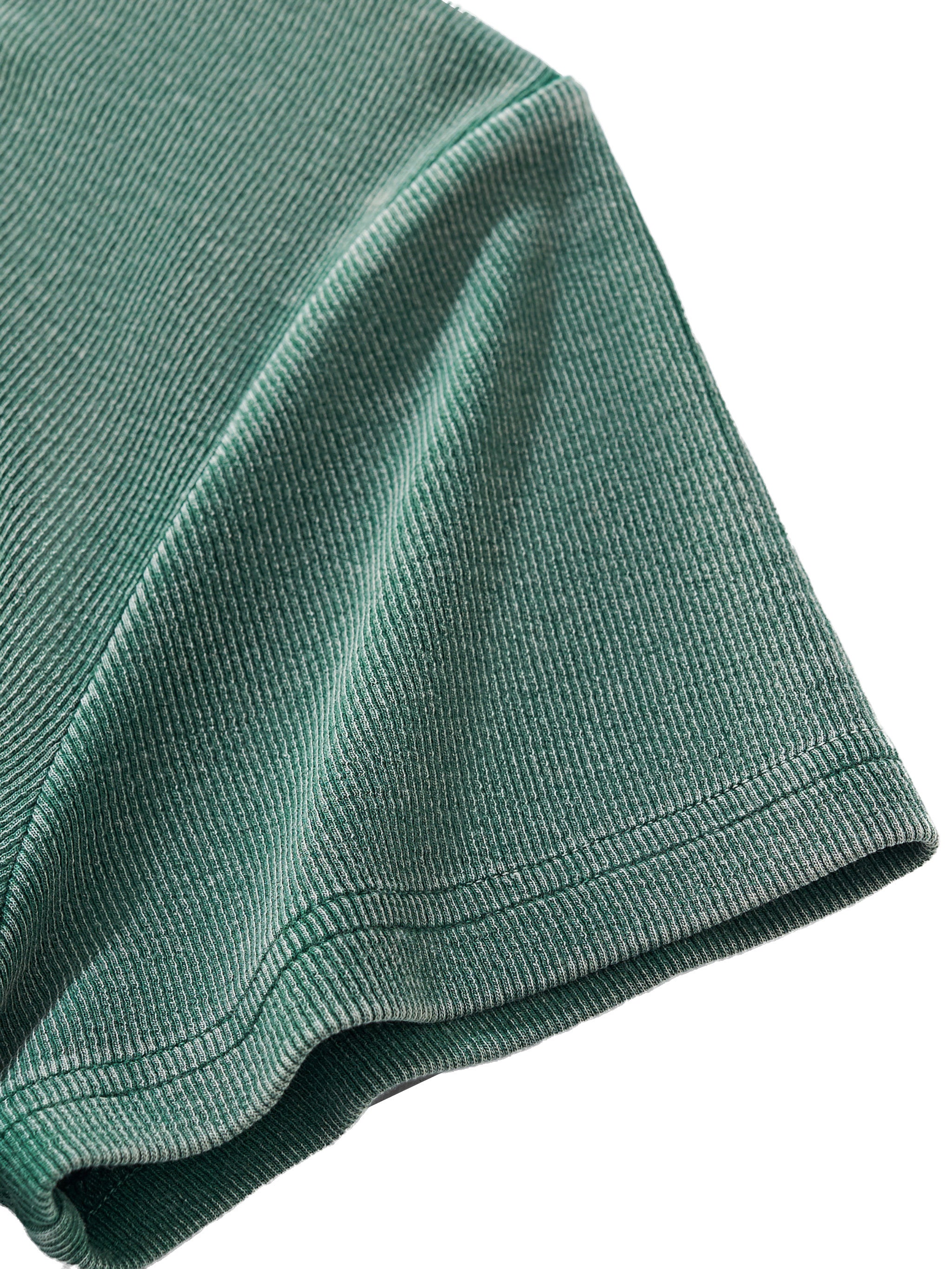 Close-up of a vintage washed green ribbed cotton blend short sleeve t-shirt.